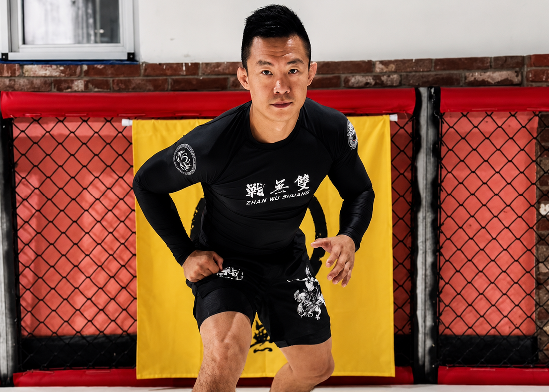 Athlete wearing ZHAN no-gi rash guard and shorts during BJJ grappling training