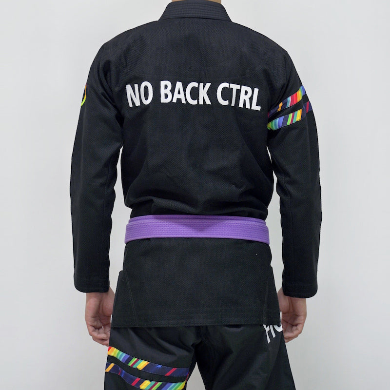 BLITZ DEFENSE Series Rainbow BJJ Set: Durable & Stylish Gi - rear view of a practitioner wearing a black gi with purple belt.