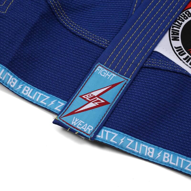 BLITZ Kids Classic BJJ Gi: Tradition & Excellence with blue jacket and logo details.