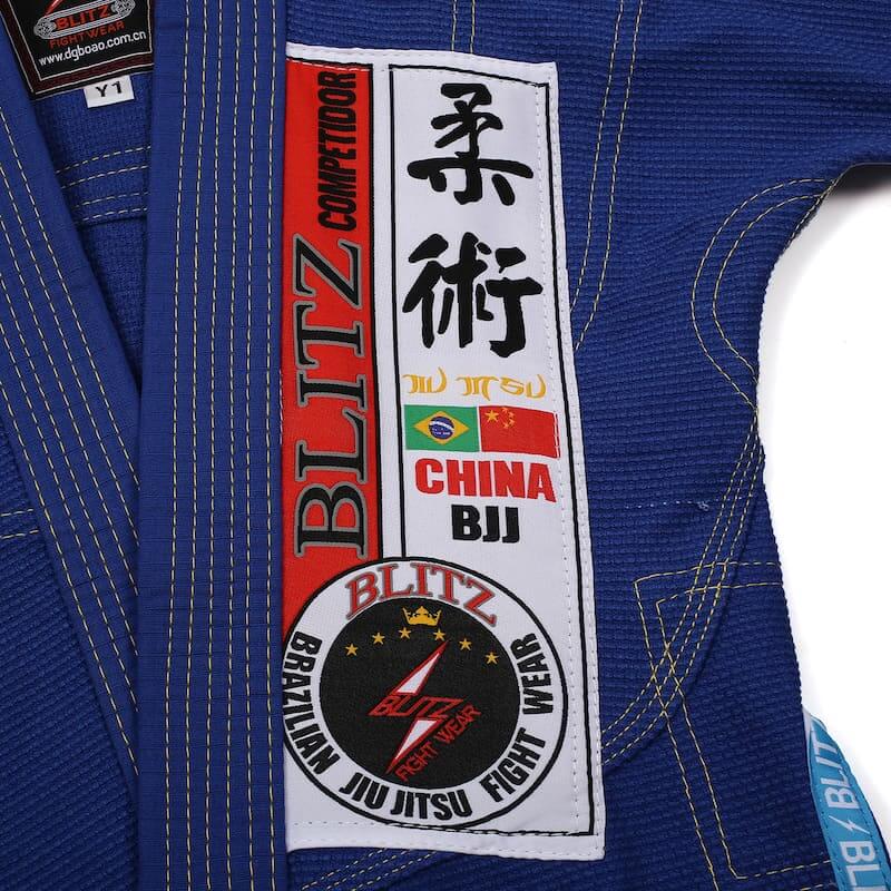 BLITZ Kids Classic BJJ Gi: Tradition & Excellence jacket patch with Brazilian Jiu-Jitsu branding.