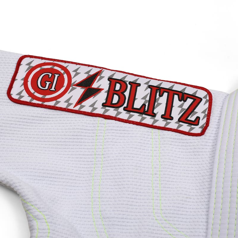 BLITZ Kids Classic BJJ Gi: Tradition & Excellence logo detail on the sleeve of a Brazilian Jiu-Jitsu gi.