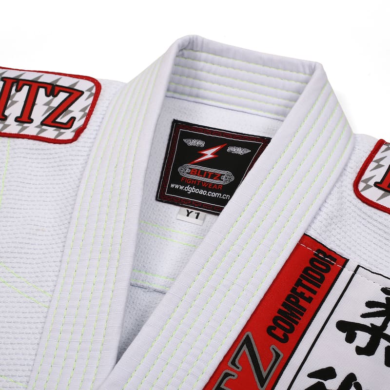 BLITZ Kids Classic BJJ Gi: Tradition & Excellence collar detail with branded patches and embroidery for young martial artists.