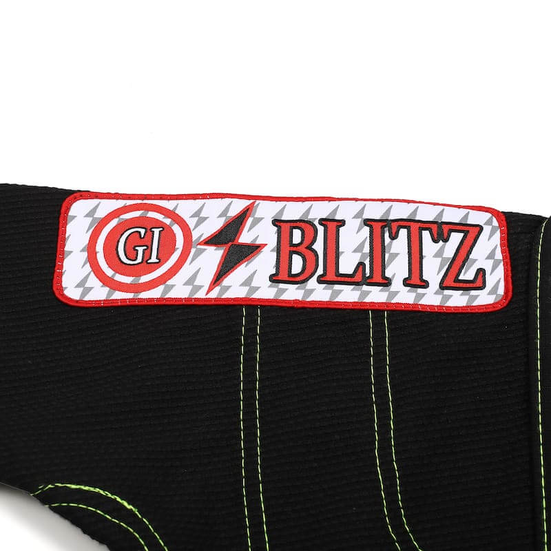 BLITZ Kids Classic BJJ Gi: Tradition & Excellence logo detail with vibrant colors and design.