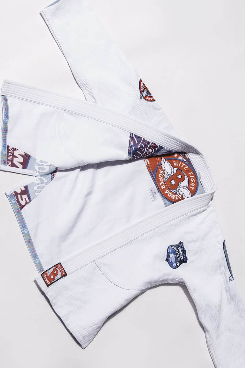 BLITZ Kids Super Power BJJ Gi featuring fun graphics and a practical design for young martial artists.