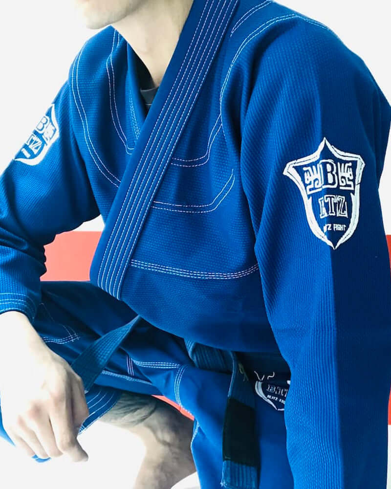 BLITZ Viking God BJJ Gi in blue, showcasing Norse-inspired design and embroidered logo.