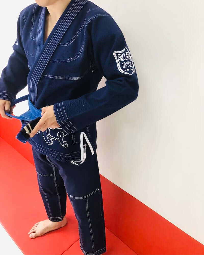 Child wearing the BLITZ Viking God BJJ Gi, showcasing its Nordic design and stylish features.