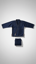 Custom BJJ Gi Sample | OEM & Club Gi Manufacturing - navy blue gi with pants displayed on a neutral background.