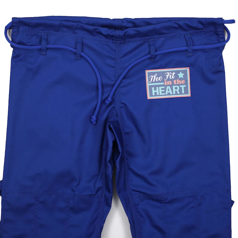ZHAN Basic Women's BJJ Gi: Embrace Elegance & Performance blue pants with adjustable drawstring and logo.