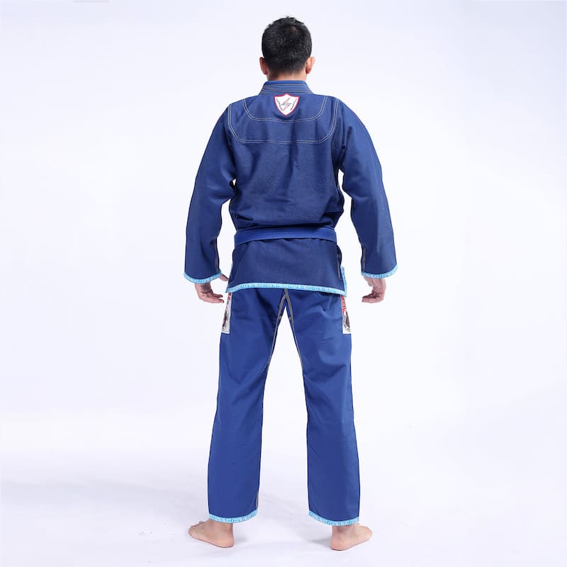 Classic BLITZ BJJ Gi: Embrace Excellence & Tradition back view of a practitioner in traditional attire.