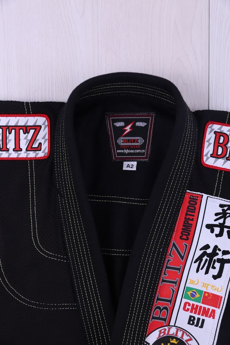Classic BLITZ BJJ Gi: Embrace Excellence & Tradition with detailed embroidery and tags.