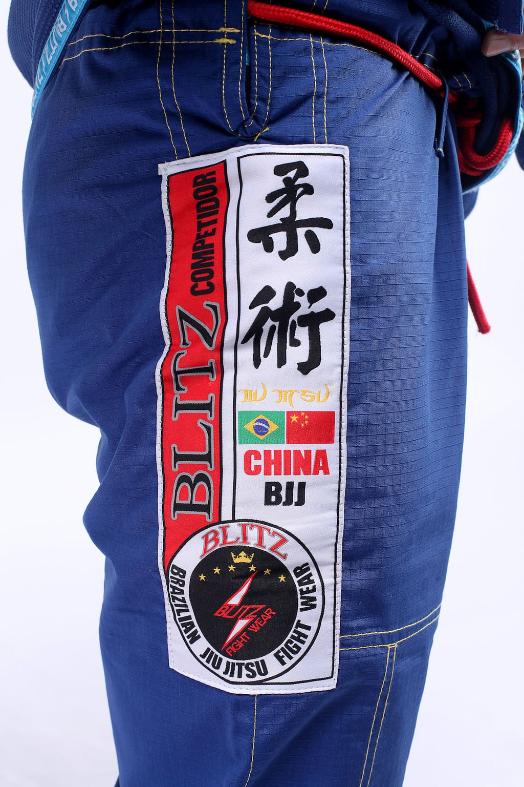 Classic BLITZ BJJ Gi: Embrace Excellence & Tradition showcasing embroidered logos and details.