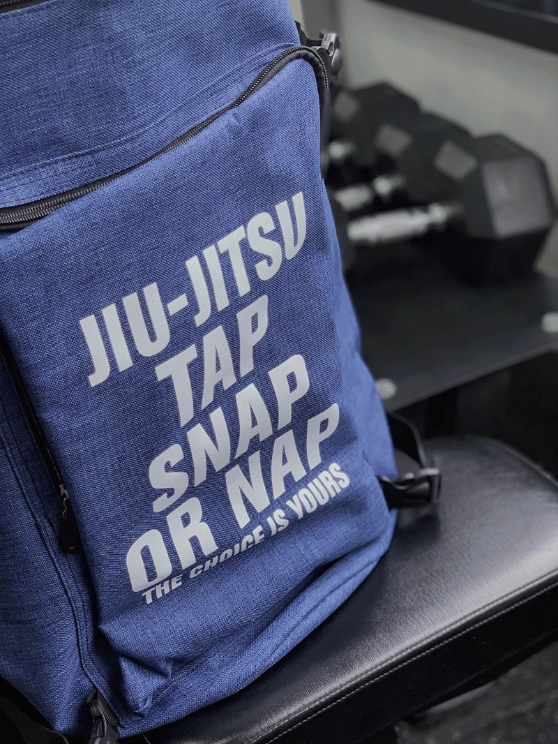 Ultimate BJJ Backpack: Spacious & Durable Gear Bag for Martial Artists with Jiu-Jitsu slogan design.