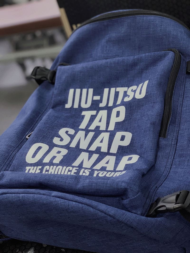 Ultimate BJJ Backpack: Spacious & Durable Gear Bag for Martial Artists featuring a Jiu-Jitsu design.
