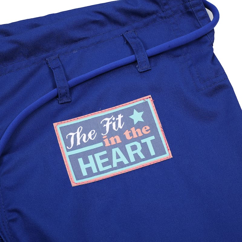 ZHAN Basic Women's BJJ Gi: Embrace Elegance & Performance logo detail on elegant blue fabric.