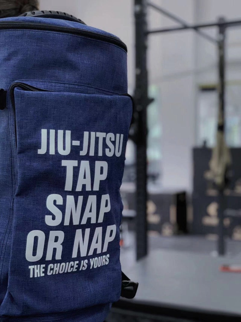 Ultimate BJJ Backpack: Spacious & Durable Gear Bag for Martial Artists with Jiu-Jitsu slogan