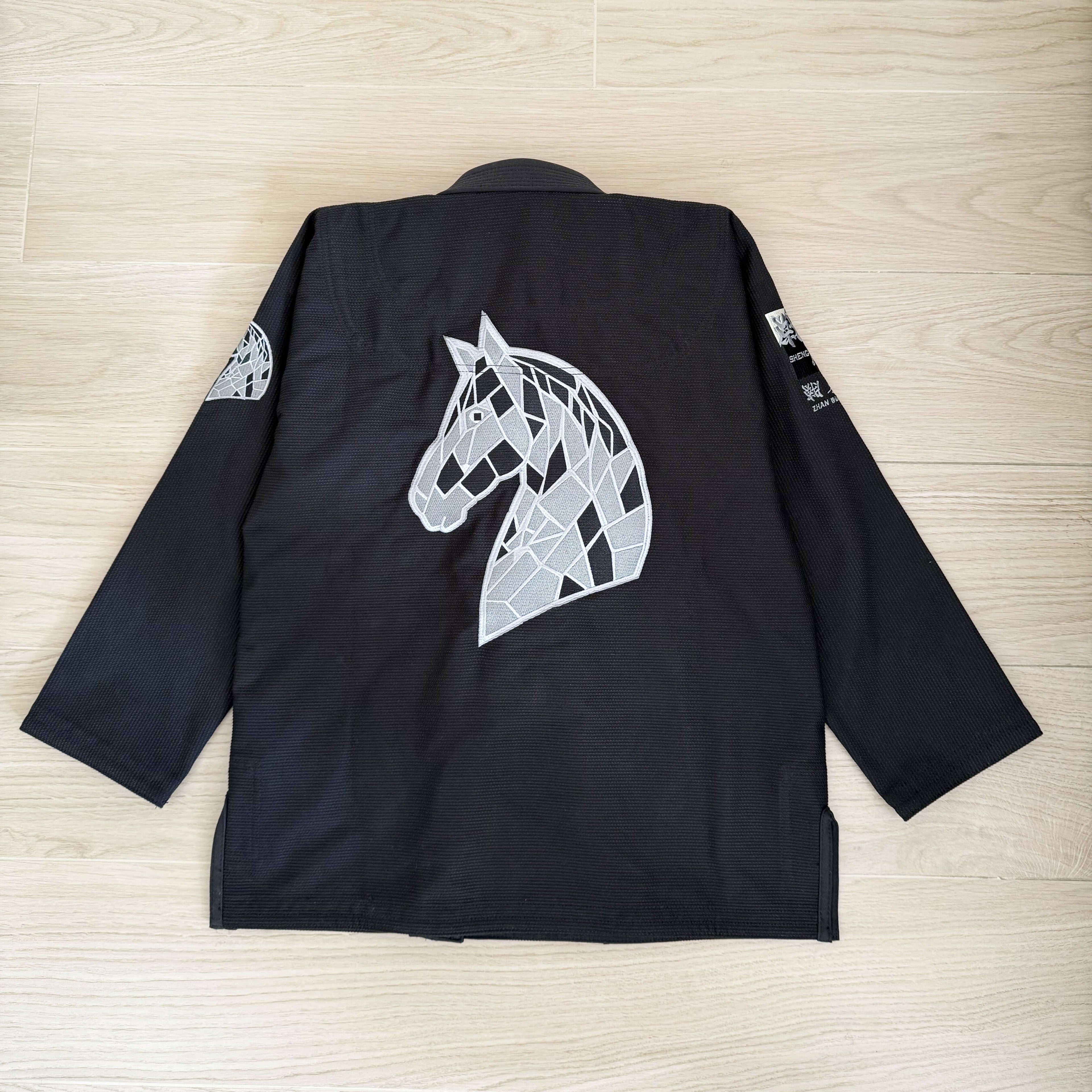 Year of the Horse Limited Edition Bamboo BJJ Gi featuring a silver-grey horse design on black fabric.
