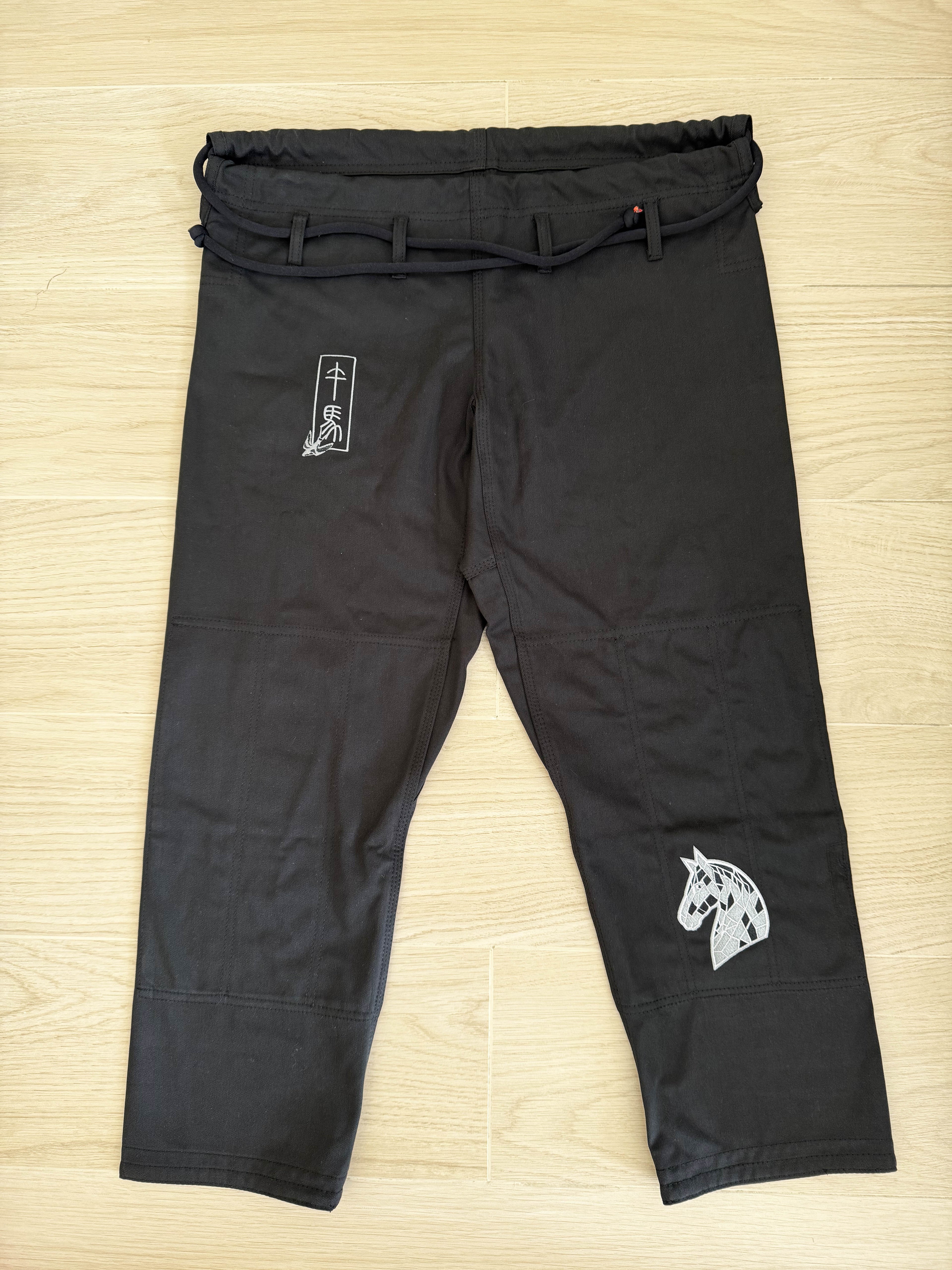 Year of the Horse Limited Edition Bamboo BJJ Gi black pants with horse artwork and belt.