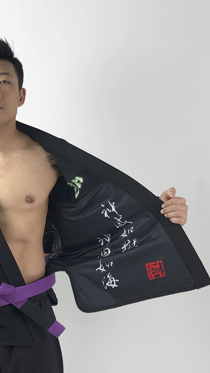 ZHAN Azure Dragon BJJ Gi showcasing intricate inner embroidery and design details.