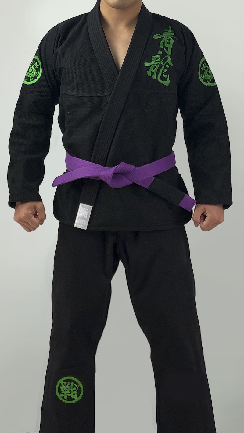 ZHAN Azure Dragon BJJ Gi featuring dragon-themed embroidery and purple belt, embodying strength and protection.