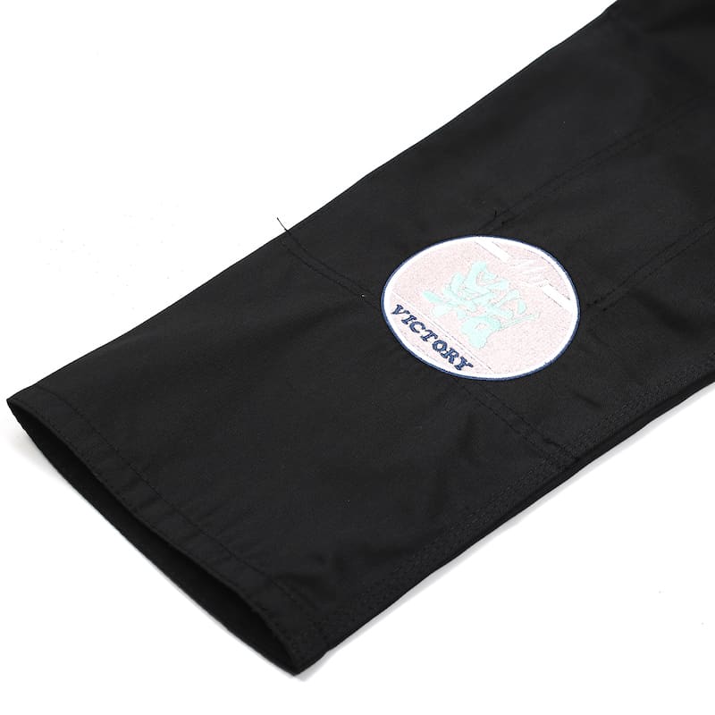 ZHAN Basic Women's BJJ Gi: Embrace Elegance & Performance - close-up of the sleeve detail.