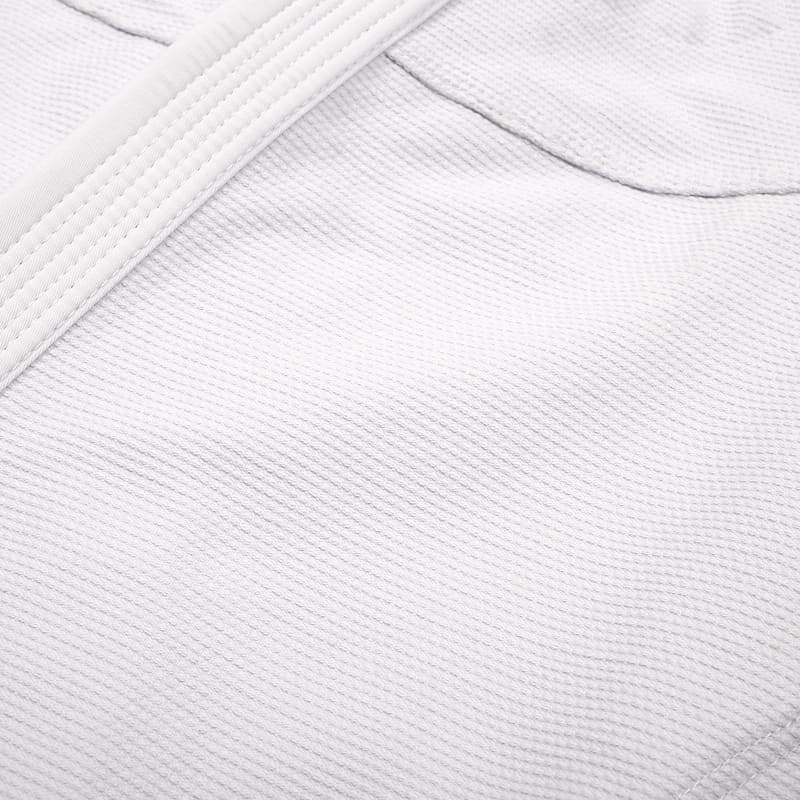 ZHAN Basic Women's BJJ Gi: Embrace Elegance & Performance - close-up of fabric texture.