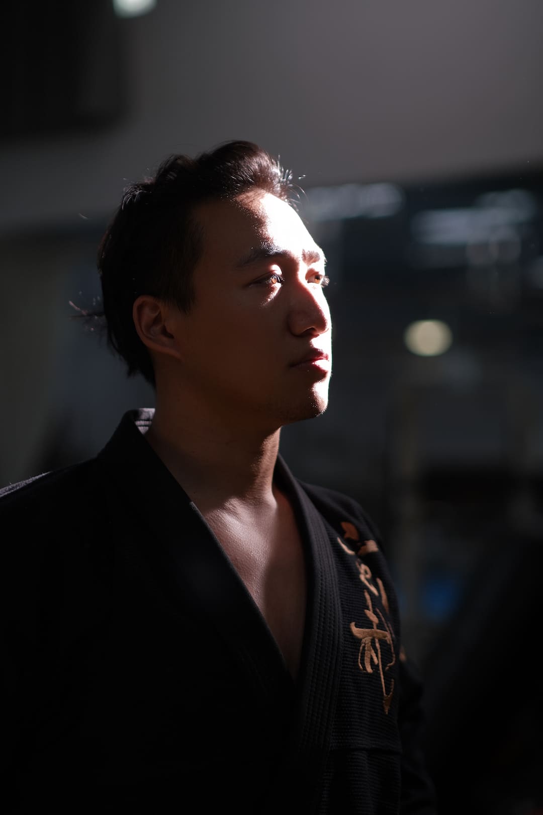 ZHAN Black Tortoise BJJ Gi on a model showcasing its unique style and detailed embroidery.