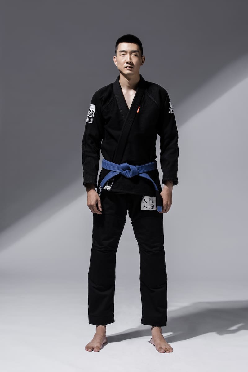 ZHAN Good vs Evil BJJ Gi worn by a fighter showcasing the inner conflict and discipline of Brazilian Jiu-Jitsu.