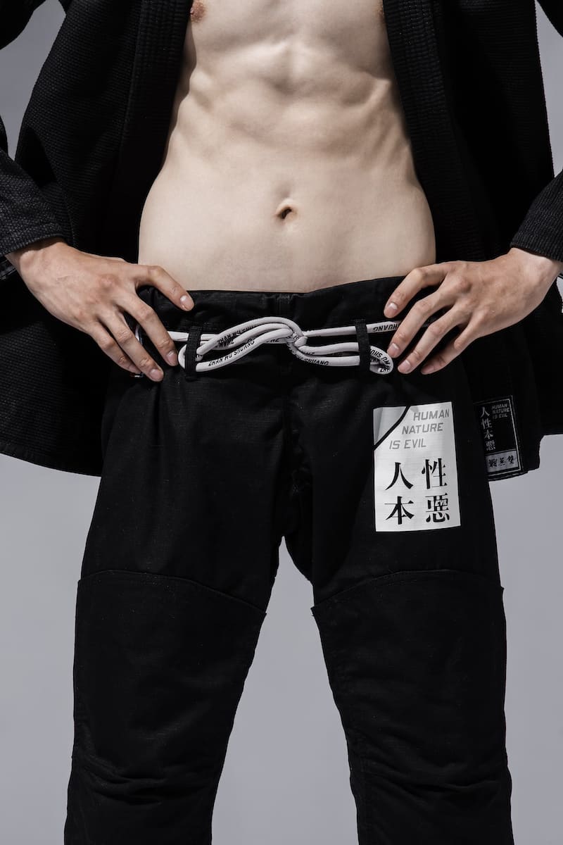 ZHAN Good vs Evil BJJ Gi showcasing black design with symbolic branding and focus on discipline and control.