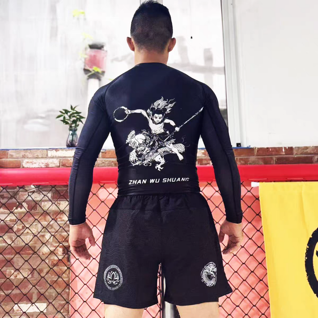 ZHAN Nezha Long Sleeve BJJ Rash Guard & No-Gi Shorts Set worn by a male athlete from behind in a training environment.