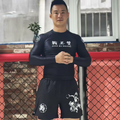 ZHAN Nezha Long Sleeve BJJ Rash Guard & No-Gi Shorts Set worn by a model in training.