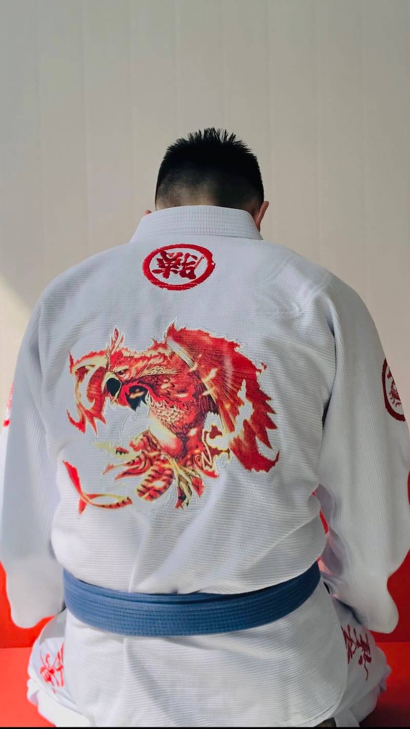 ZHAN Vermilion Phoenix BJJ Gi featuring intricate phoenix embroidery on the back, designed for Brazilian Jiu-Jitsu practitioners.