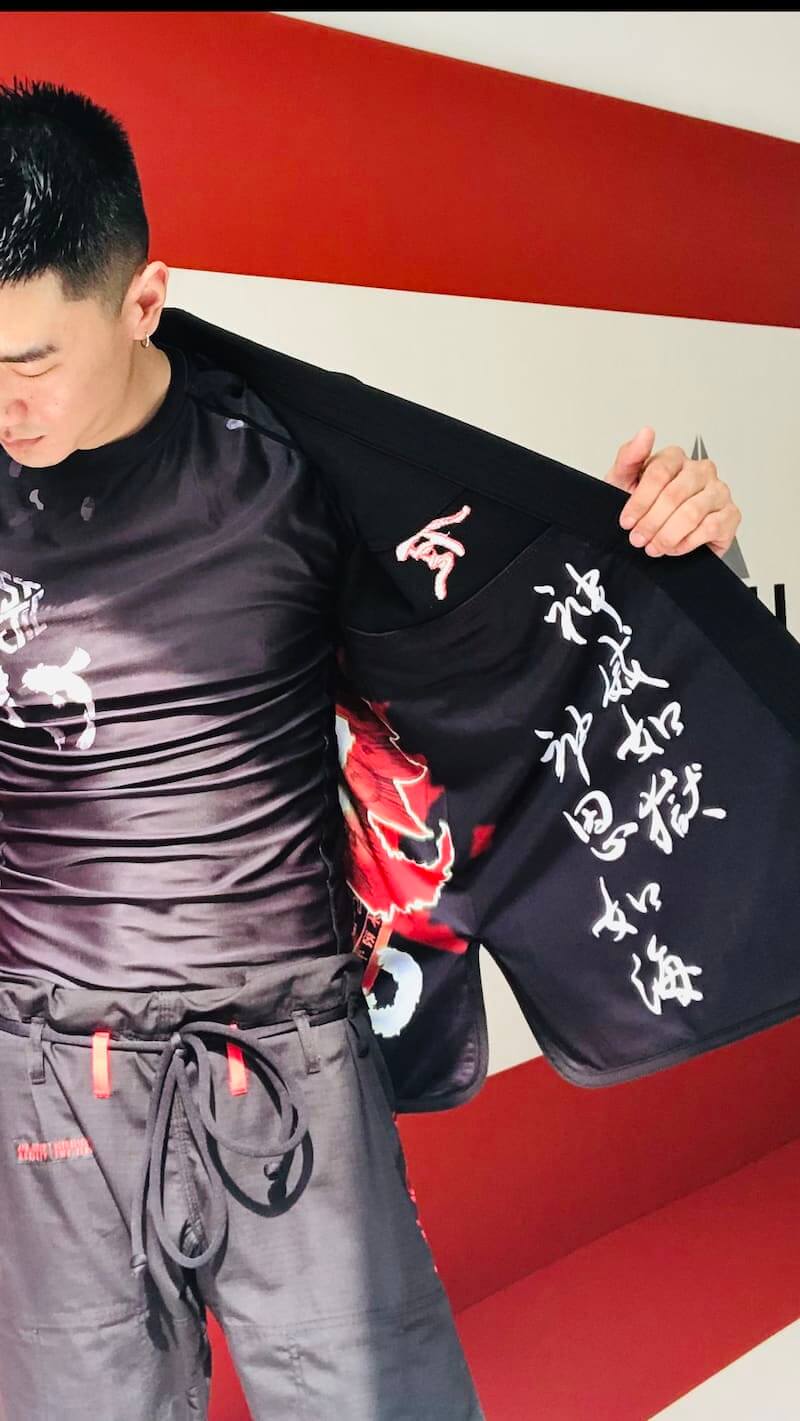 ZHAN Vermilion Phoenix BJJ Gi featuring phoenix-themed artwork and intricate embroidery.