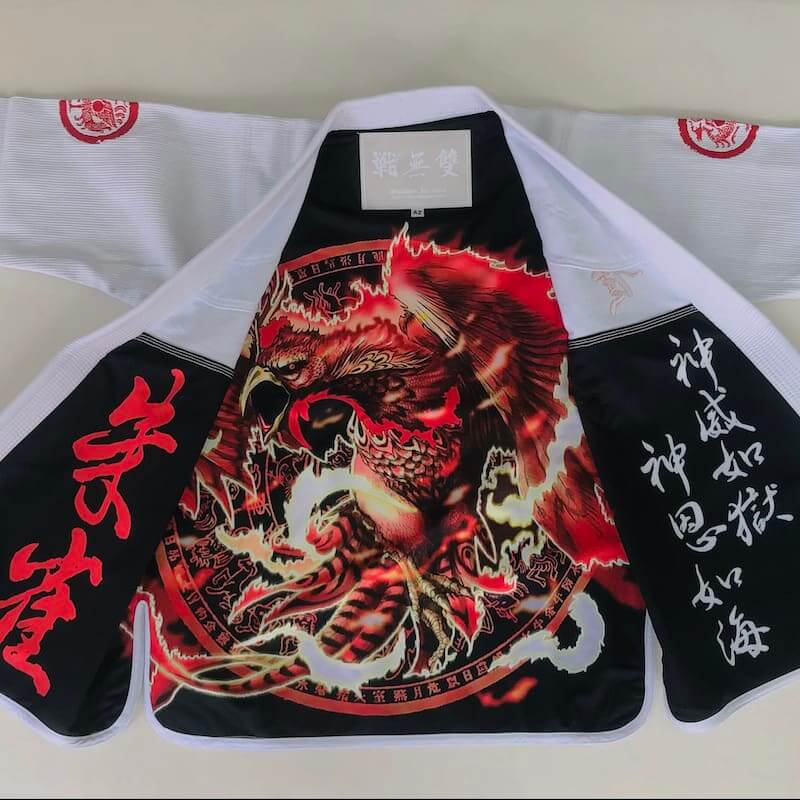 ZHAN Vermilion Phoenix BJJ Gi featuring vibrant phoenix artwork and intricate embroidery.