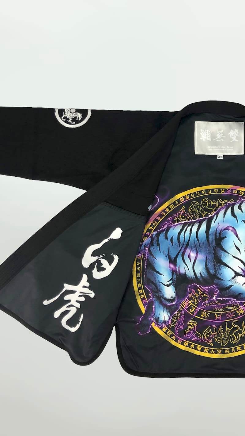 ZHAN White Tiger BJJ Gi showcasing intricate tiger-themed artwork and embroidery.