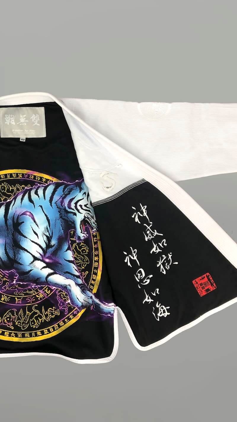 ZHAN White Tiger BJJ Gi featuring tiger-themed artwork and intricate embroidery.