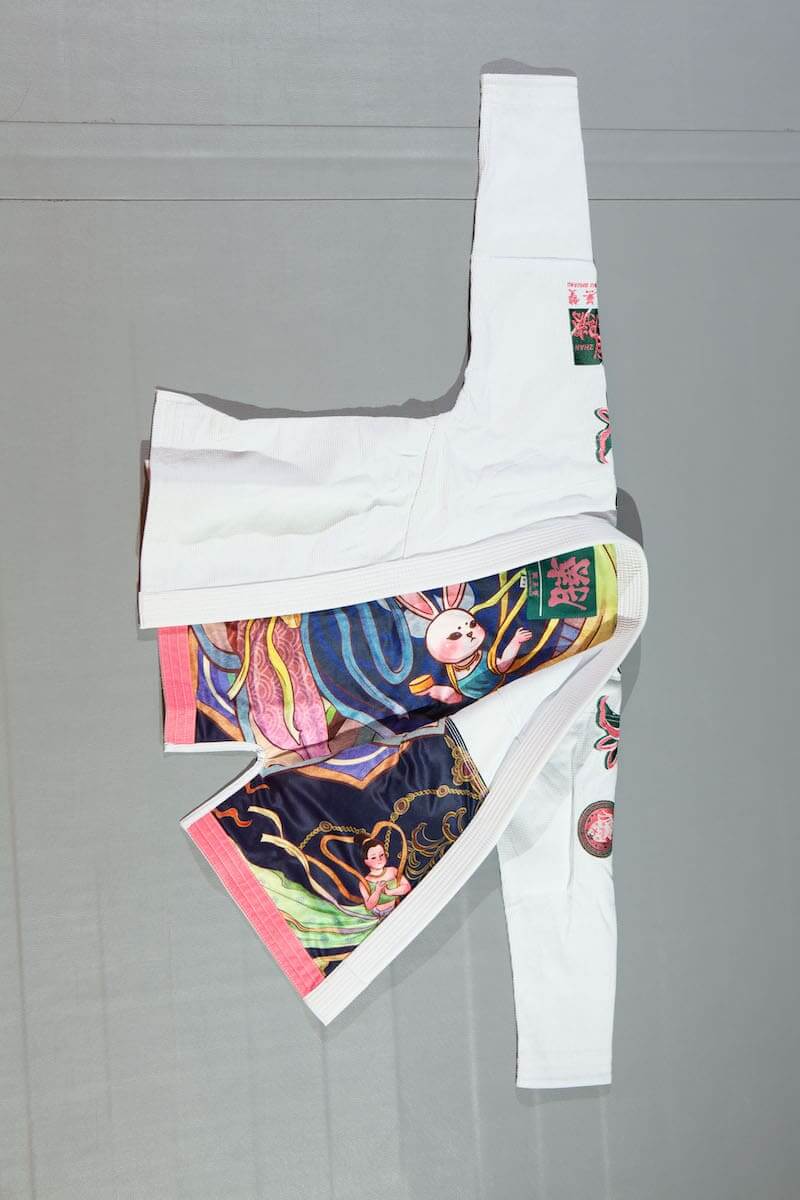 ZHAN Women's Year of the Rabbit BJJ Gi: Embrace Tradition & Elegance showcasing intricate rabbit motifs and vibrant colors.