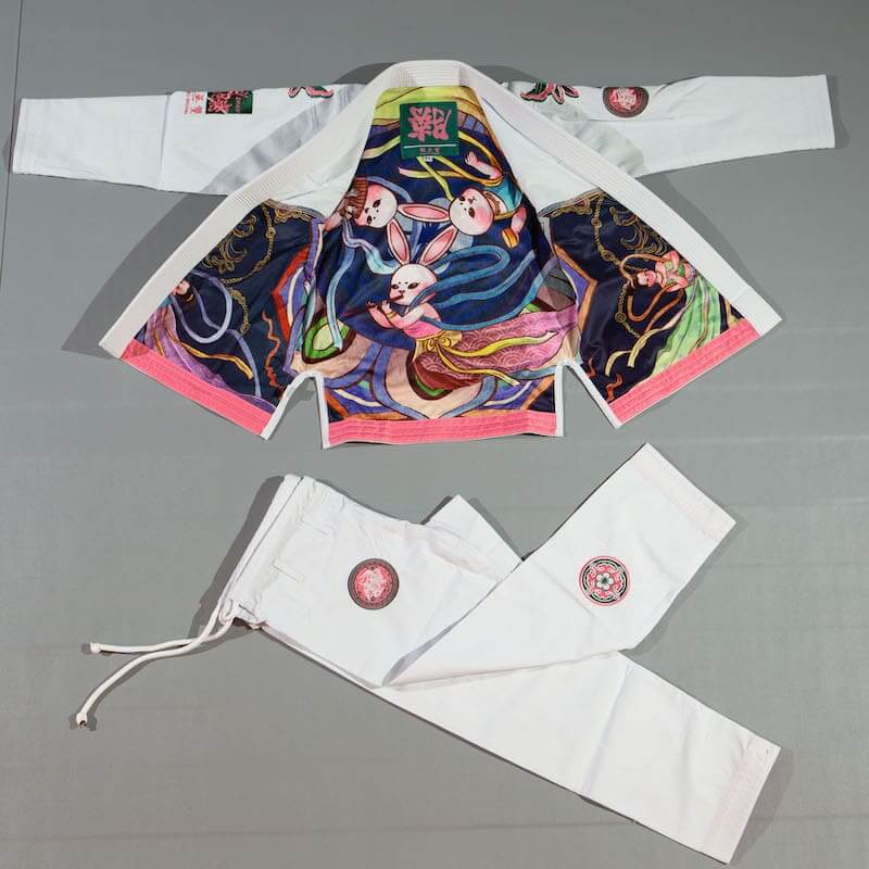 ZHAN Women's Year of the Rabbit BJJ Gi: Embrace Tradition & Elegance showcasing intricate rabbit motifs.