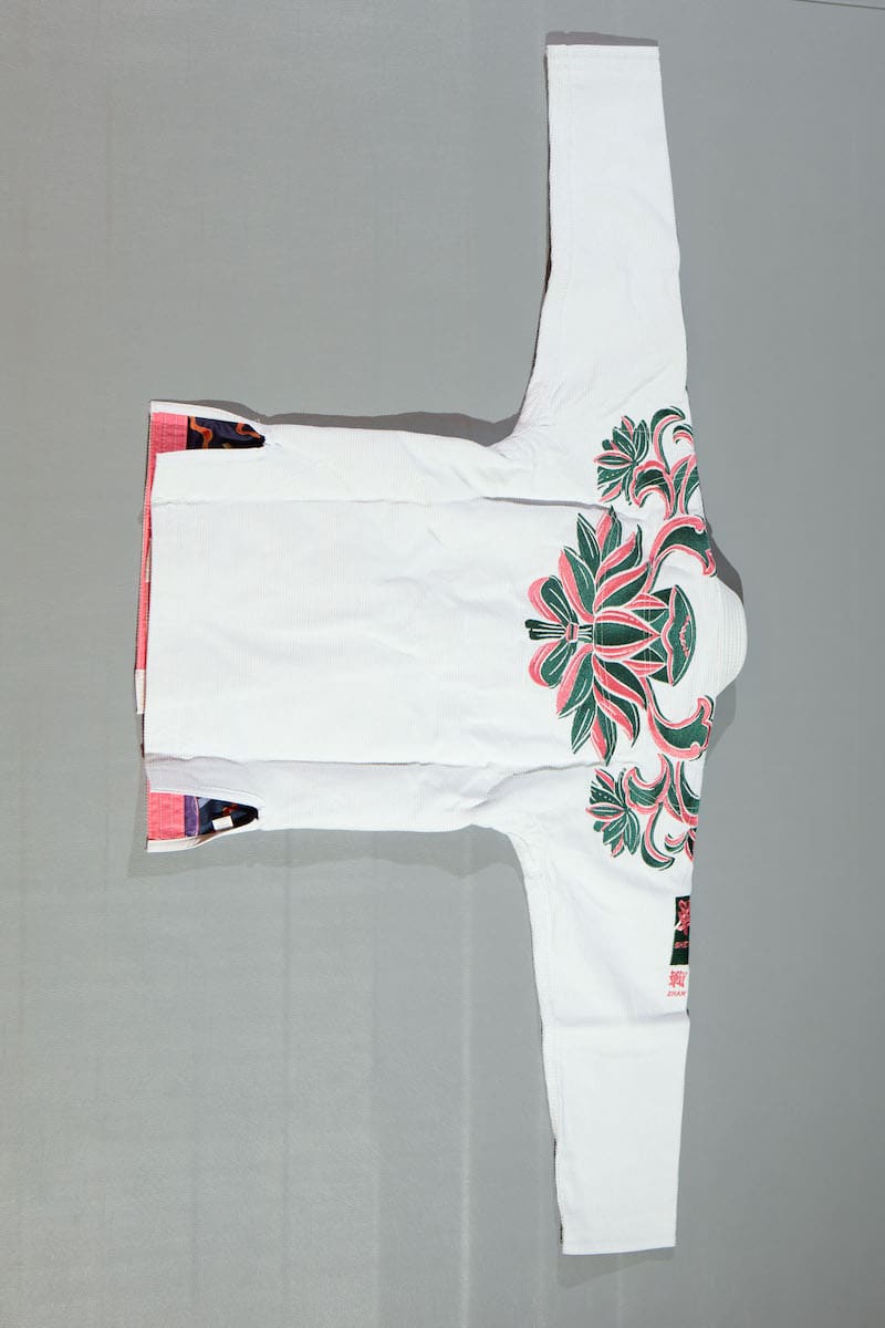 ZHAN Women's Year of the Rabbit BJJ Gi: Embrace Tradition & Elegance featuring intricate rabbit motifs.