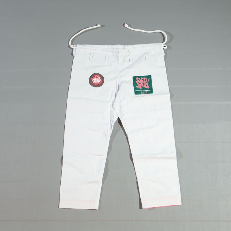 ZHAN Women's Year of the Rabbit BJJ Gi: Embrace Tradition & Elegance, showcasing white pants with unique patches.