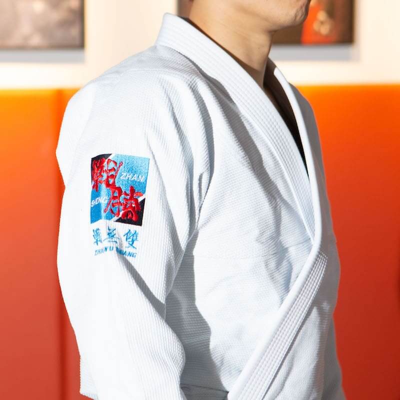 ZHAN Year of the Rabbit BJJ Gi: Embrace the Zodiac Spirit - Side view showcasing the logo and design details.