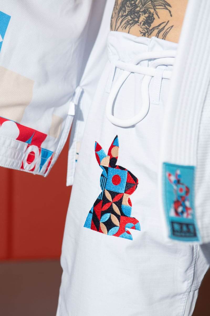 ZHAN Year of the Rabbit BJJ Gi: Embrace the Zodiac Spirit featuring rabbit embroidery on white gi.