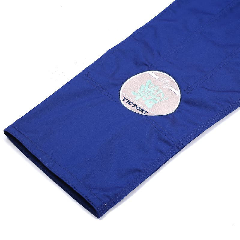 ZHAN Basic Women's BJJ Gi: Embrace Elegance & Performance blue sleeve detail with logo